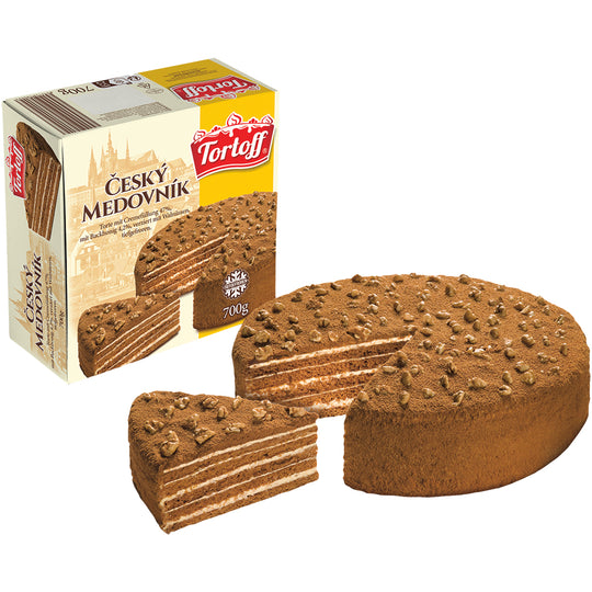 "TORTOFF" Gâteau fourré à la crème 47 %, avec 4,2 % de miel, décoré de noix, surgelé.